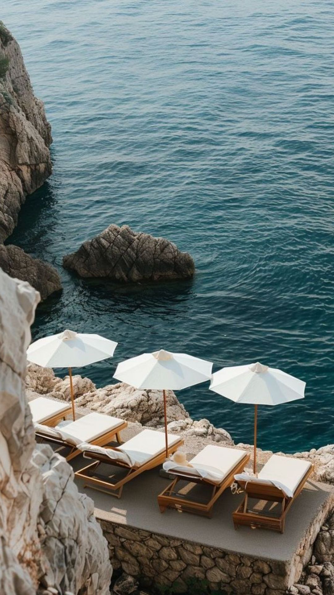 Cliffside beach loungers